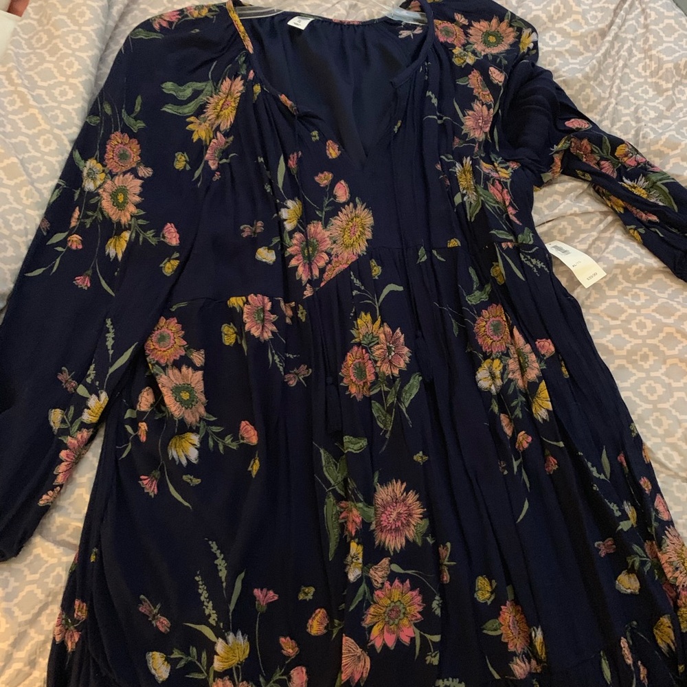 Never worn, still has tags on dress